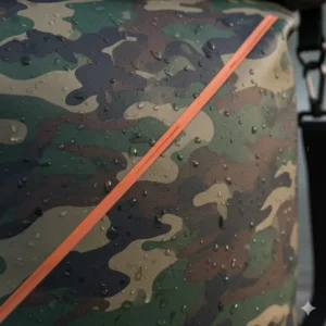 Close-up shot of the durable material and camouflage pattern of the dry bag, highlighting the high-frequency welded seams.