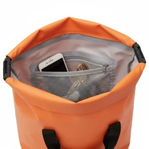 Inside view of the 20l drybag showing the internal organization pocket for small items like keys and a phone, keeping contents dry and organized.