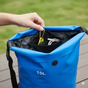An image showing the inside of the open 15L dry bag, focusing on the internal zippered pocket designed for keeping small, essential items secure and separate.