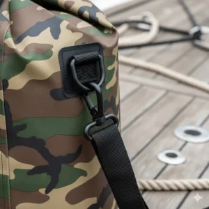 Close-up of the strong D-rings on the camo dry bag, ideal for easily securing the bag to a boat or ATV using straps.