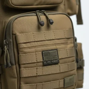 Detailed view of the Mil-Spec PALS webbing system on the exterior of the tactical backpack made in usa for secure attachments.