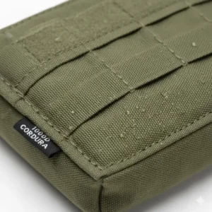 Close-up texture shot of the durable, water-resistant Cordura material used to construct the heavy-duty tactical admin pouch for maximum longevity.