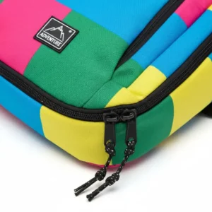 Close-up detail of the water-resistant polyester fabric on a multicolor backpack.