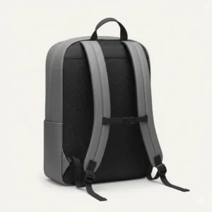 Detailed view of the padded ergonomic shoulder straps on a lightweight minimal backpack.