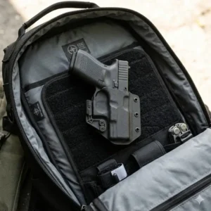 Interior view of a backpack showing the hidden holster system used in quality ccw bags for men.