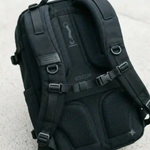 The breathable mesh back panel and padded shoulder straps of a comfortable edc carry backpack.