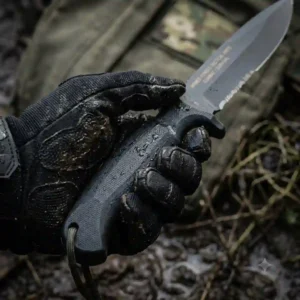 Gloved hand demonstrating the non-slip grip on an armed force tactical knife handle.