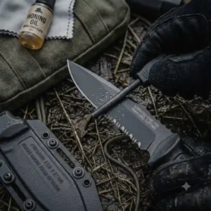 Sharpening the edge of a military armed force tactical knife using a field ceramic sharpener.
