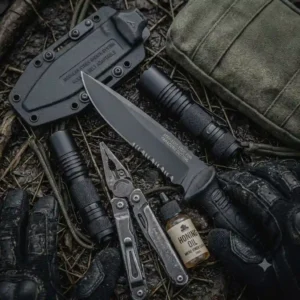 Military equipment layout featuring an armed force tactical knife alongside essential combat gear.